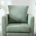 Sillón tapizado verde 26.77 con patas de madera maciza