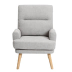 Juego de sillón y otomana de tela